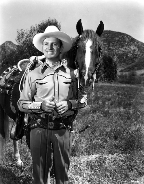 Gene Autry with a cowboy hat and horse Photo Print - Item # VARCEL681208