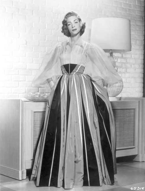 Lauren Bacall wearing a striped dress Photo Print - Item # VARCEL681233