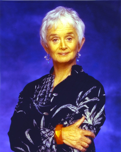 Barbara Barrie wearing Black Dress in Blue Background Photo Print - Item # VARCEL681370