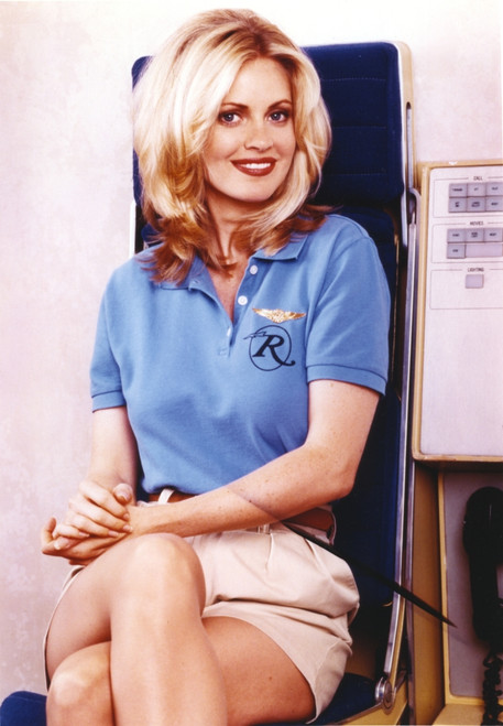 Kristin Bauer Seated in Blue Golfer Shirt Photo Print - Item # VARCEL681774