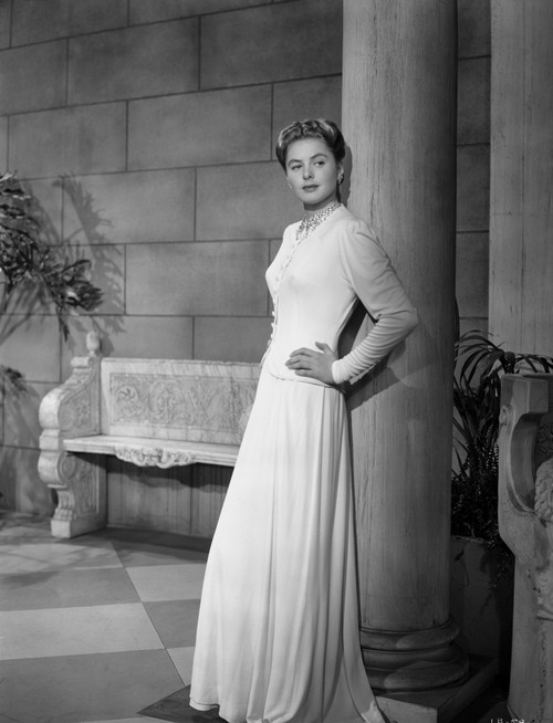 Ingrid Bergman Leaning on Post and Hand on Waist Photo Print - Item # VARCEL681957