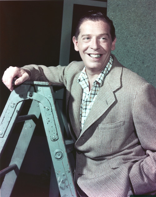 Milton Berle smiling on a Ladder Photo Print - Item # VARCEL682073