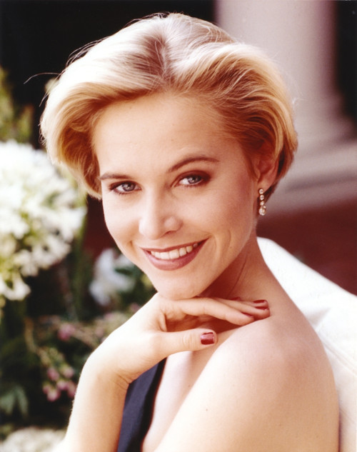 Josie Bissett Showing Her Smile and Her Earrings in a Portrait Photo Print - Item # VARCEL682142