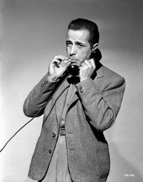 Humphrey Bogart on telephone smoking Photo Print - Item # VARCEL682302