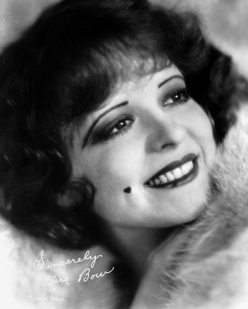 Clara Bow smiling in Fur Dress with Mole on Right Cheeks Photo Print - Item # VARCEL682460