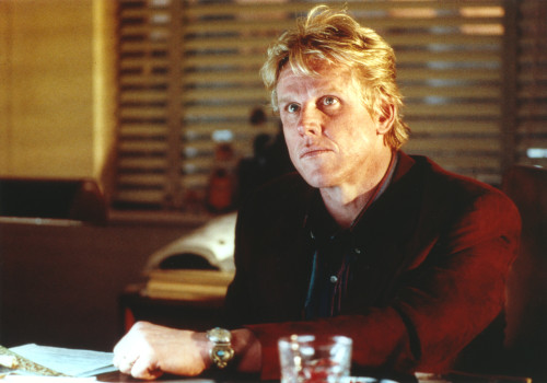 Gary Busey sitting in Red Long Sleeves Portrait Photo Print - Item # VARCEL683109