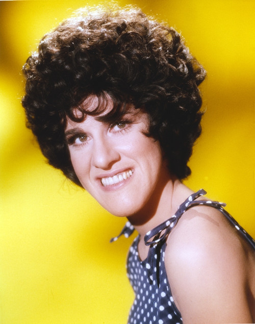 Ruth Buzzi smiling in Yellow Background Portrait Photo Print - Item # VARCEL683168