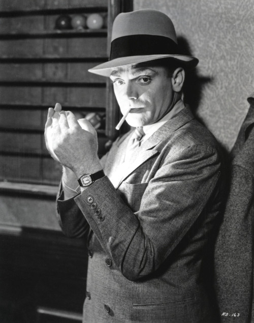Film still of James Cagney smoking a cigarette and wearing a fedora Photo Print - Item # VARCEL683251
