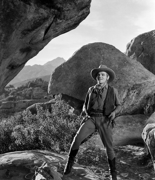 James Cagney standing with Legs Spread in Cowboy Outfit Classic Portrait Photo Print - Item # VARCEL683275