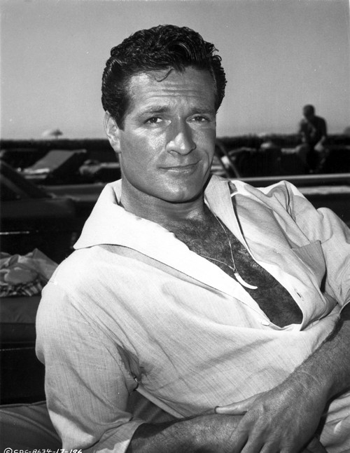 Hugh O'Brian reclining outdoors Photo Print - Item # VARCEL683333