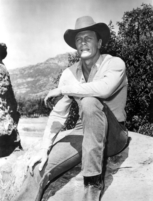 Peter Graves sitting outdoors wearing a cowboy hat Photo Print - Item # VARCEL683421