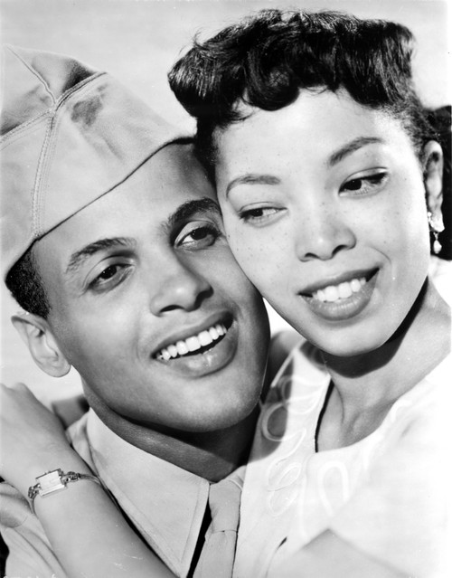 Harry Belafonte in military uniform with a woman Photo Print - Item # VARCEL683585
