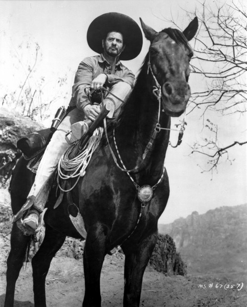 Eli Wallach on horseback Photo Print - Item # VARCEL683630