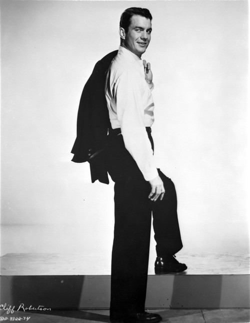 Cliff Robertson with his jacket over his shoulder Photo Print - Item # VARCEL683655