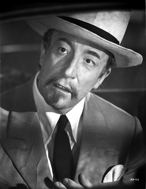 Film still of Peter Sellers looking through a car window Photo Print - Item # VARCEL683724