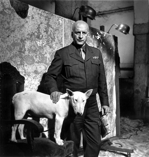 George C Scott in military uniform with a dog Photo Print - Item # VARCEL683741