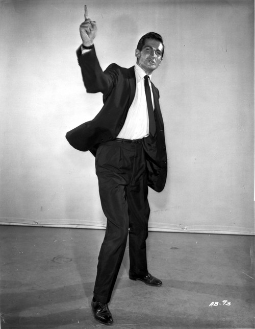George Hamilton wearing a suit Photo Print - Item # VARCEL683794