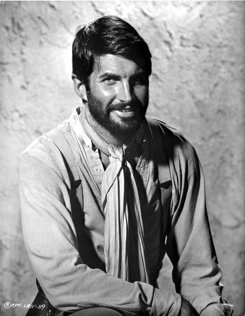 George Hamilton wearing a neckerchief Photo Print - Item # VARCEL683796
