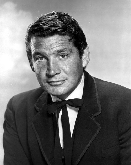 Gene Barry wearing a neck ribbon Photo Print - Item # VARCEL683811