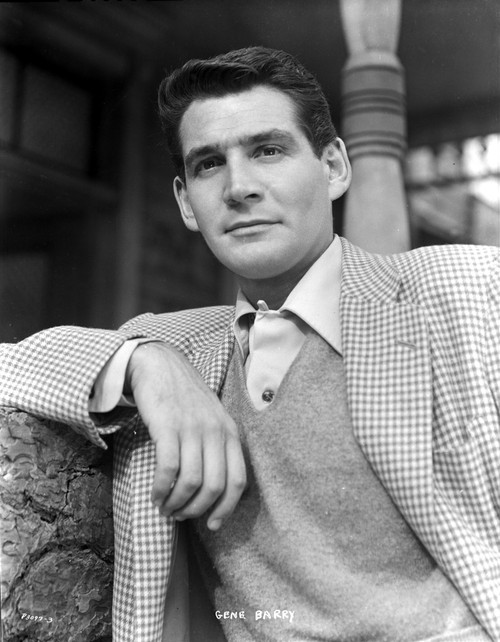 Gene Barry wearing a gingham jacket outdoors Photo Print - Item # VARCEL683814