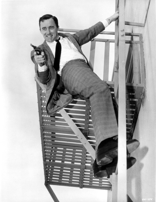 Film still of Robert Vaughn carrying a pistol Photo Print - Item # VARCEL683868