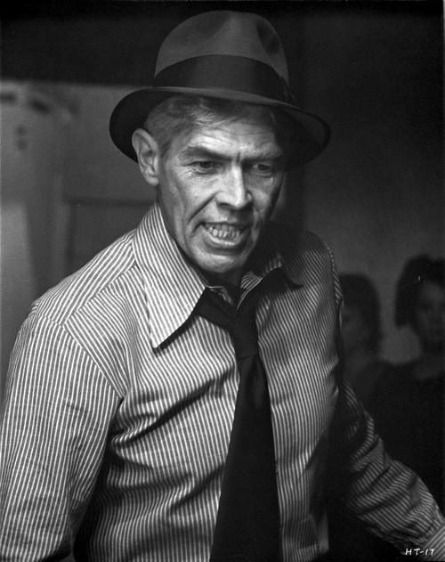 Film still of James Coburn looking angry Photo Print - Item # VARCEL683989