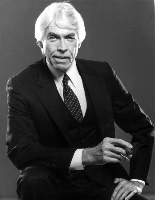 James Coburn wearing a suit Photo Print - Item # VARCEL683990