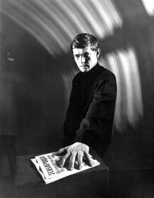 Tom Courtenay in Black Suit With Newspaper Photo Print - Item # VARCEL683993