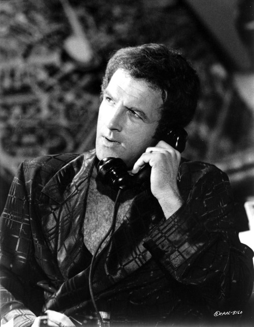 Film still of James Caan talking on the telephone Photo Print - Item # VARCEL684007