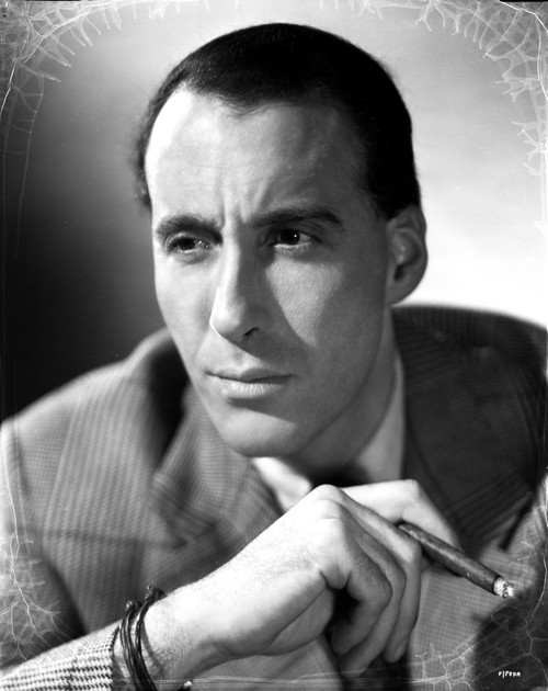 Christopher Lee smoking a cigar Photo Print - Item # VARCEL684021