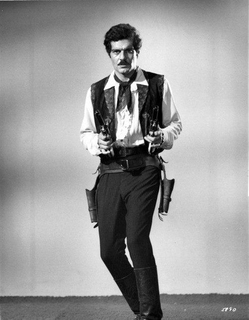 Omar Sharif in a cowboy costume for Mackenna's Gold Photo Print - Item # VARCEL684053