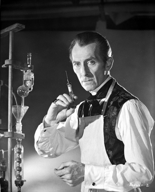 Peter Cushing holding a syringe Photo Print - Item # VARCEL684161