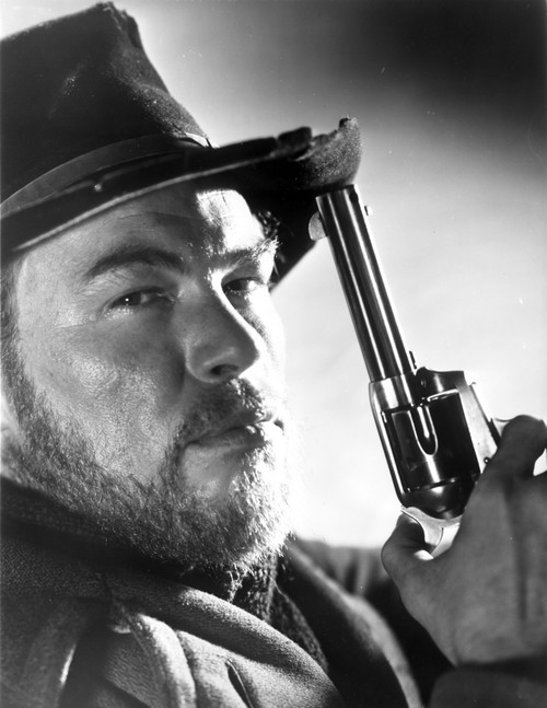Jack Lambert holding a gun Photo Print - Item # VARCEL684169