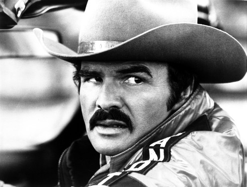 Film still of Burt Reynolds looking over his shoulder wearing a cowboy hat Photo Print - Item # VARCEL684176