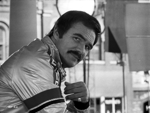 Burt Reynolds wearing a metallic jacket Photo Print - Item # VARCEL684180