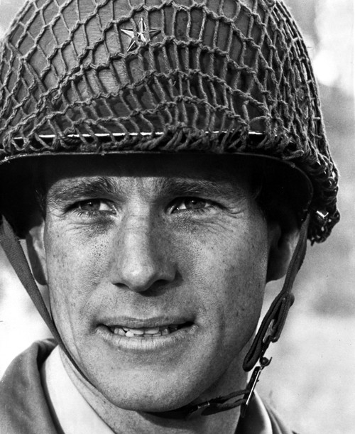 Ryan O'Neal in a military helmet Photo Print - Item # VARCEL684372
