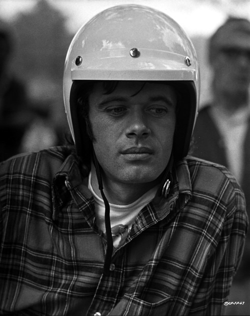 Film still of Michael Sarrazin wearing a helmet Photo Print - Item # VARCEL684377