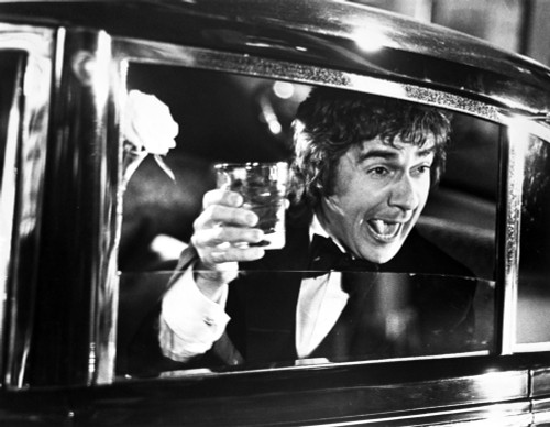 Dudley Moore in a car window Photo Print - Item # VARCEL684445