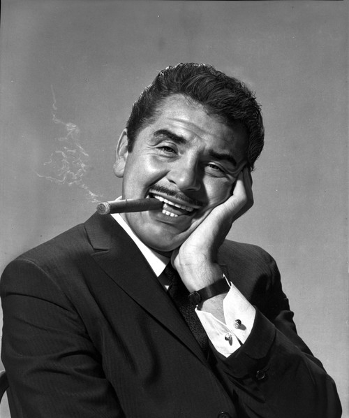 Ernie Kovacs smoking a cigar Photo Print - Item # VARCEL684457