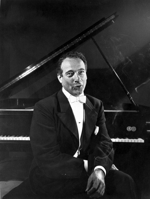 Victor Borge with a piano Photo Print - Item # VARCEL684529