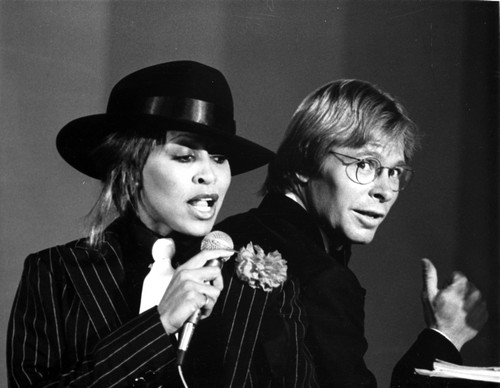John Denver and Tina Turner performing Photo Print - Item # VARCEL684628
