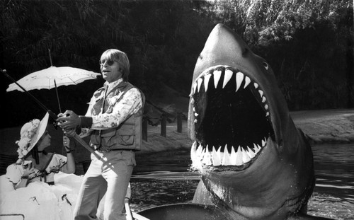 Film still featuring John Denver fishing by a shark Photo Print - Item # VARCEL684629