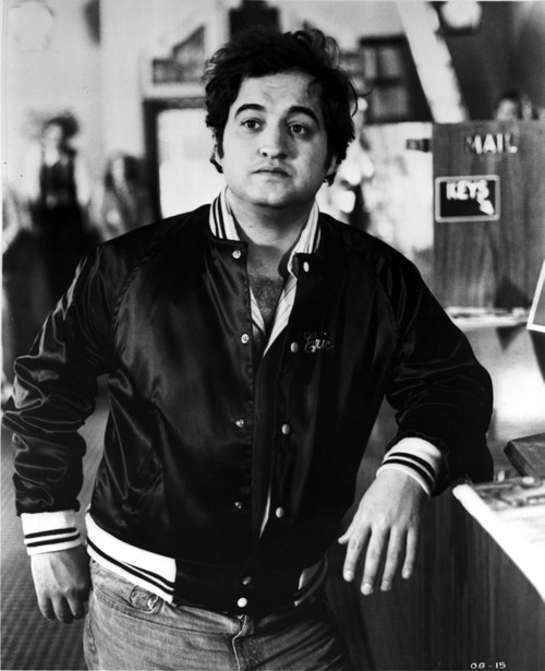 Film still featuring John Belushi wearing a bomber jacket Photo Print - Item # VARCEL684751