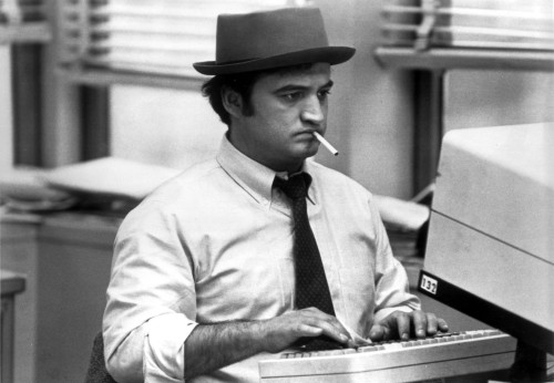 Film still featuring John Belushi using a computer Photo Print - Item # VARCEL684757