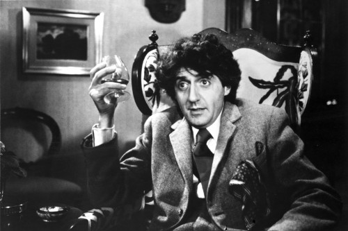 A film still of Tom Conti holding a glass Photo Print - Item # VARCEL684773