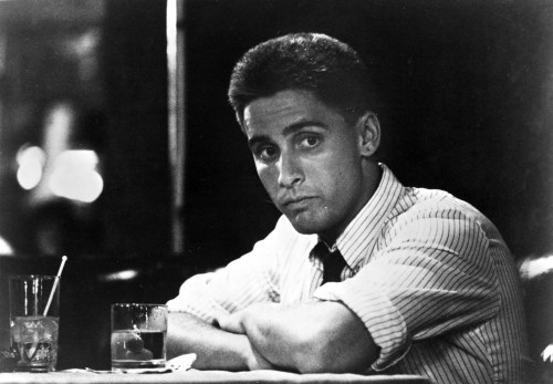 A film still of Emilio Estevez sitting at a bar Photo Print - Item # VARCEL684779