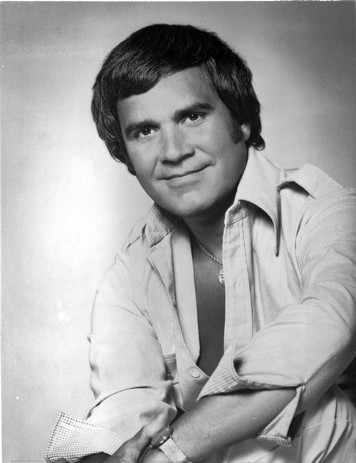 Rich Little wearing an unbuttoned shirt Photo Print - Item # VARCEL684831