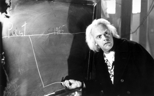 Film still of Christopher Lloyd with a chalkboard Photo Print - Item # VARCEL684833