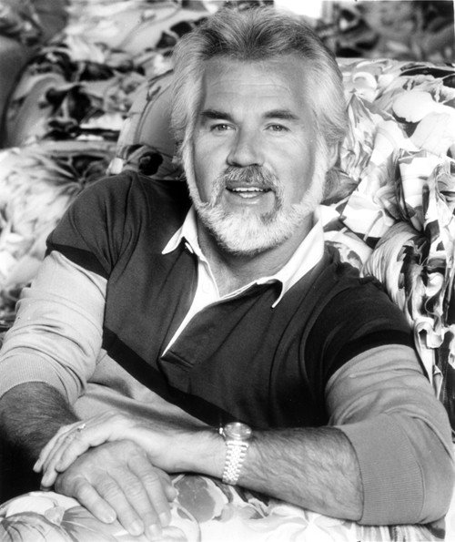 Kenny Rogers wearing a polo shirt Photo Print - Item # VARCEL684862