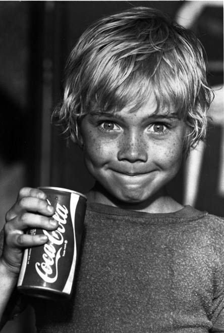 A Ricky Schroder drinking Coca Cola Photo Print - Item # VARCEL684881